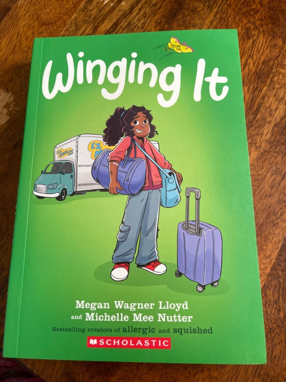 Scholastic Winging It - Green Cover with Purple Luggage